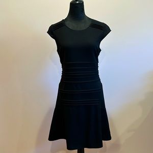 Black stretch cap sleeve dress with zipper detail